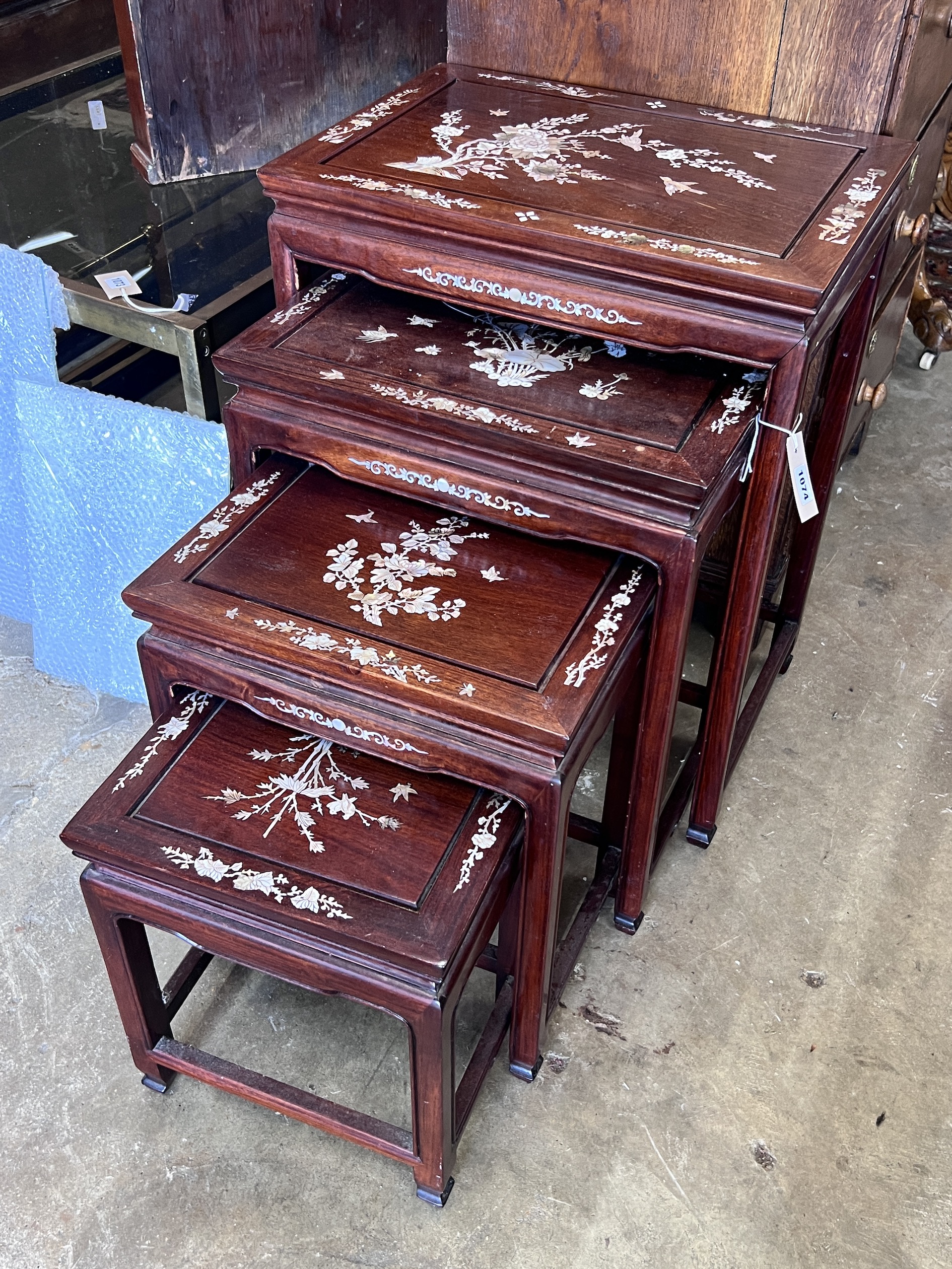 A quartetto of Chinese mother of pearl inlaid rectangular hardwood tea tables, width 51cm, depth 36cm, height 66cm